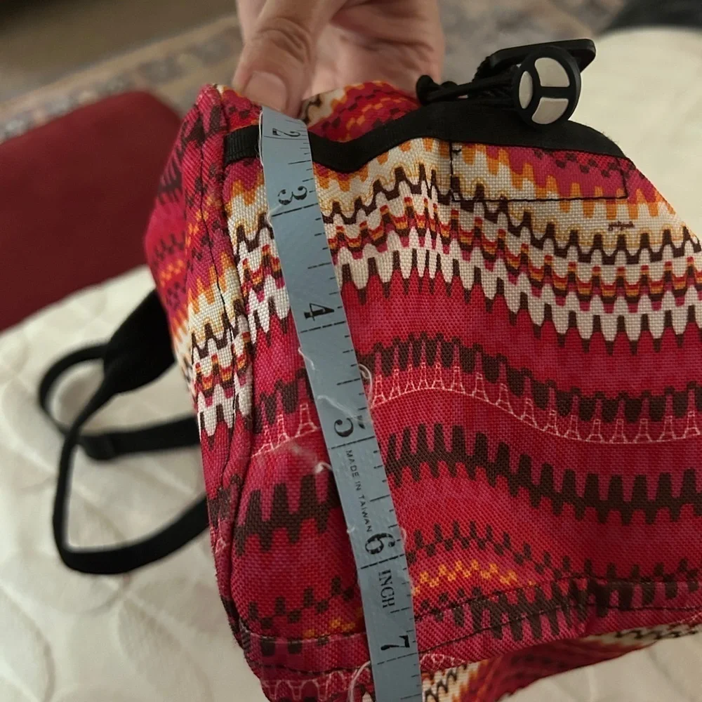 Like new YakPak duffle bag. Pink colorful zigzag design with black details